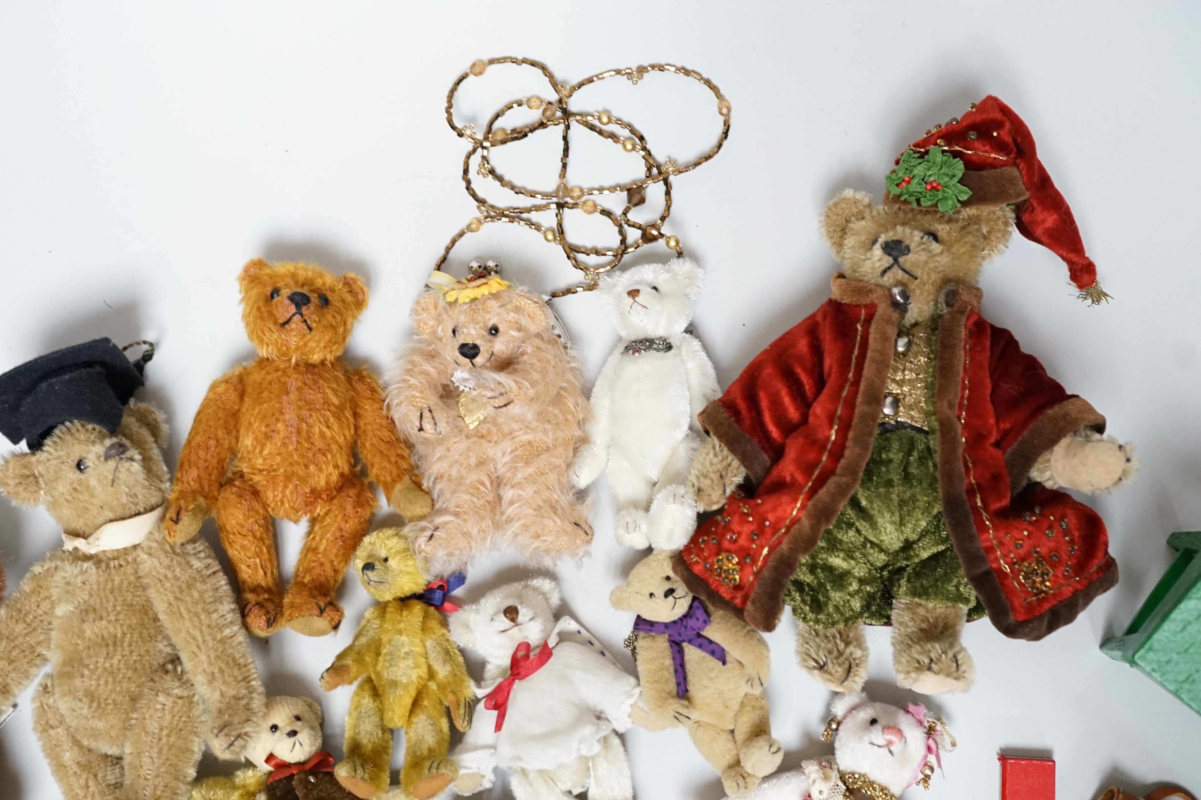 Twelve miniature American artist's bears and one rabbit